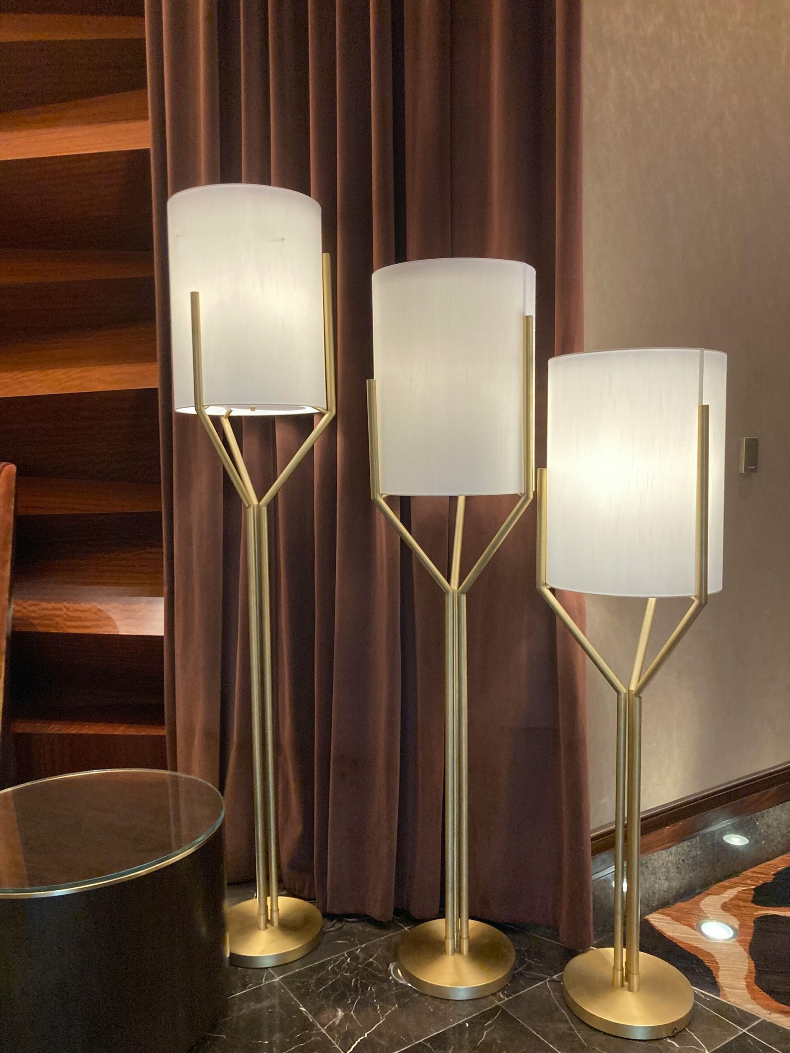 Elegant and contemporary floor lamps in a modern home interior setting.